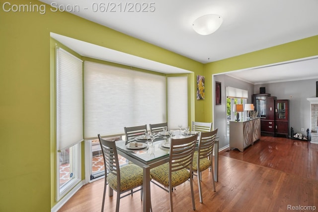21898 Aspen Ct, Farmington Hills, MI 48335 - dining area featuring wood finished floors and ornamental molding