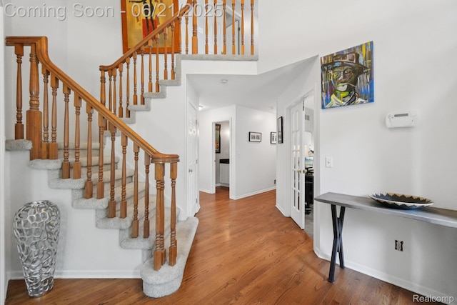 21898 Aspen Ct, Farmington Hills, MI 48335 - entryway featuring wood finished floors and stairs