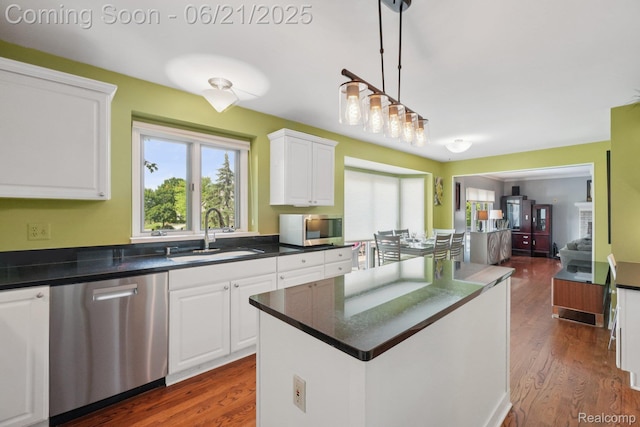 21898 Aspen Ct, Farmington Hills, MI 48335 - kitchen featuring stainless steel appliances, dark countertops, dark wood-style floors, and white cabinetry