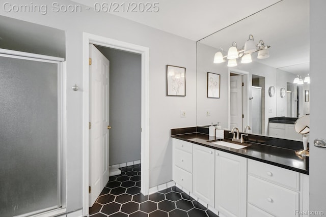 21898 Aspen Ct, Farmington Hills, MI 48335 - bathroom featuring a stall shower, vanity, and tile patterned floors