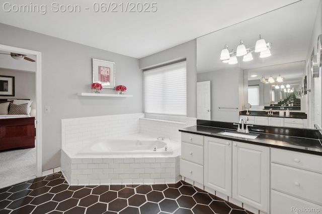 21898 Aspen Ct, Farmington Hills, MI 48335 - full bath featuring vanity, a garden tub, ensuite bathroom, and tile patterned floors