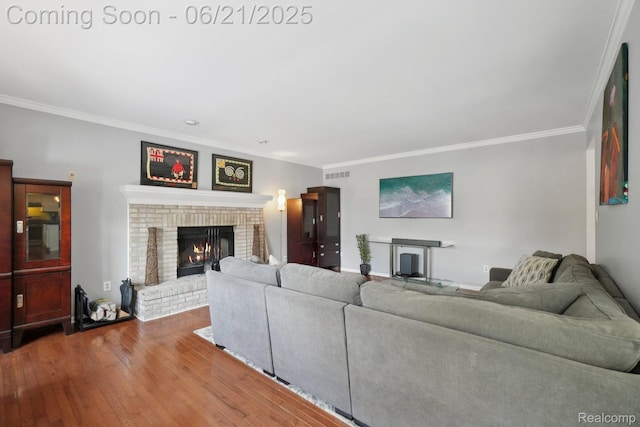 21898 Aspen Ct, Farmington Hills, MI 48335 - living room with a fireplace, ornamental molding, and wood finished floors