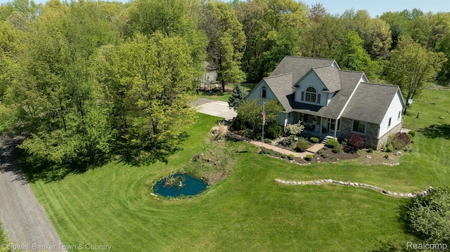 1355 Maxfield Rd, Brighton, MI 48114 - view of subject property with a large body of water and a forest