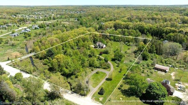 1355 Maxfield Rd, Brighton, MI 48114 - view of property location with property boundaries highlighted and a heavily wooded area