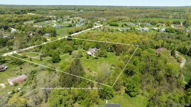 1355 Maxfield Rd, Brighton, MI 48114 - aerial view of property's location featuring property parcel outlined and a heavily wooded area