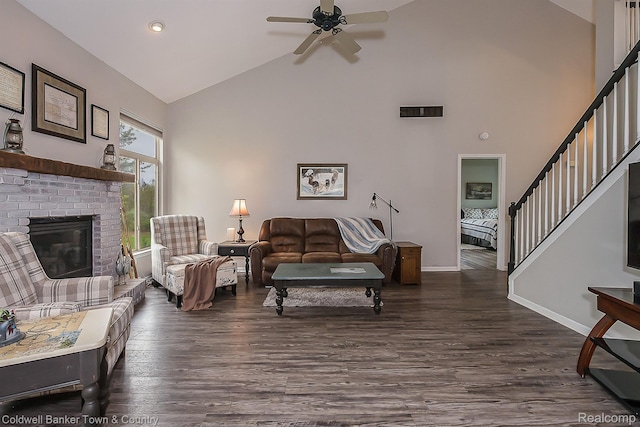 1355 Maxfield Rd, Brighton, MI 48114 - living room featuring high vaulted ceiling, a ceiling fan, wood finished floors, a brick fireplace, and stairs