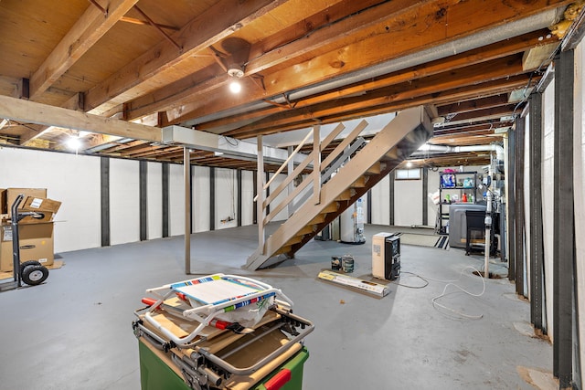 645 Amity Ave, Muskegon, MI 49442 - unfinished below grade area with stairs and water heater