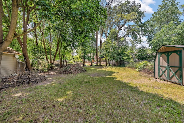 645 Amity Ave, Muskegon, MI 49442 - fenced backyard with a shed