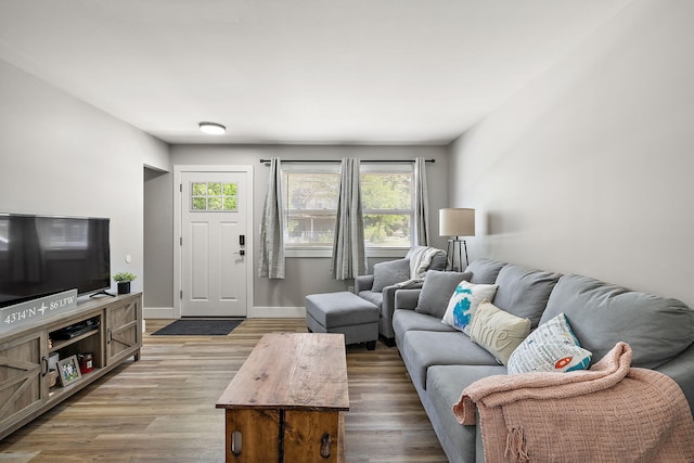 645 Amity Ave, Muskegon, MI 49442 - living area with light wood-type flooring and baseboards