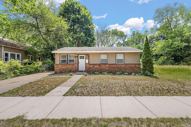 645 Amity Ave, Muskegon, MI 49442 - view of front facade with brick siding