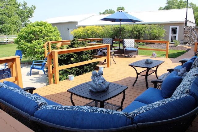 7680 S Warner Ave, Fremont, MI 49412 - wooden deck with an outdoor living space
