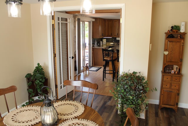 7680 S Warner Ave, Fremont, MI 49412 - dining area featuring wood finished floors