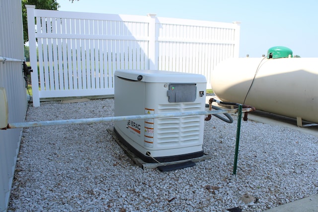 7680 S Warner Ave, Fremont, MI 49412 - exterior view of a power unit and heating fuel tank