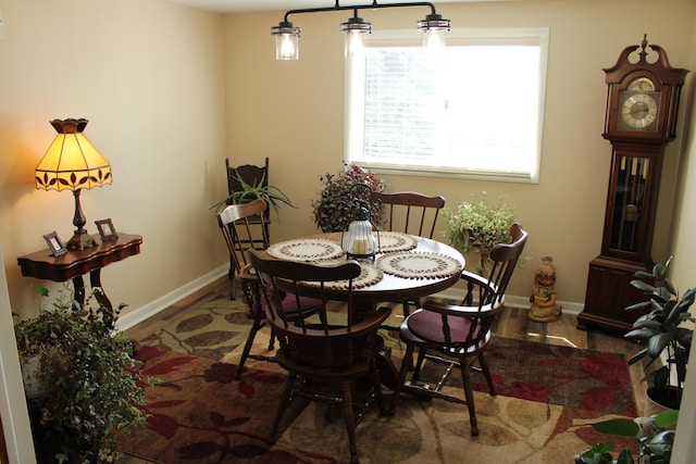 7680 S Warner Ave, Fremont, MI 49412 - dining area featuring wood finished floors and baseboards