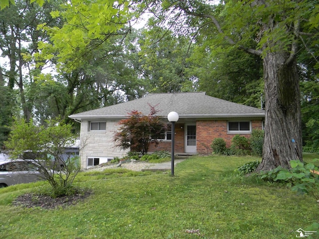 6864 Hazeldell Dr, Temperance, MI 48182 - view of front of property with a front yard and roof with shingles