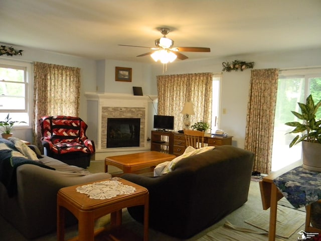6864 Hazeldell Dr, Temperance, MI 48182 - carpeted living area featuring ceiling fan and a glass covered fireplace