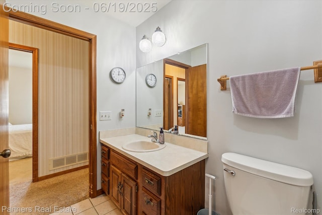 8331 Hilton Rd, Brighton, MI 48114 - bathroom with vanity, tile patterned flooring, and ensuite bathroom
