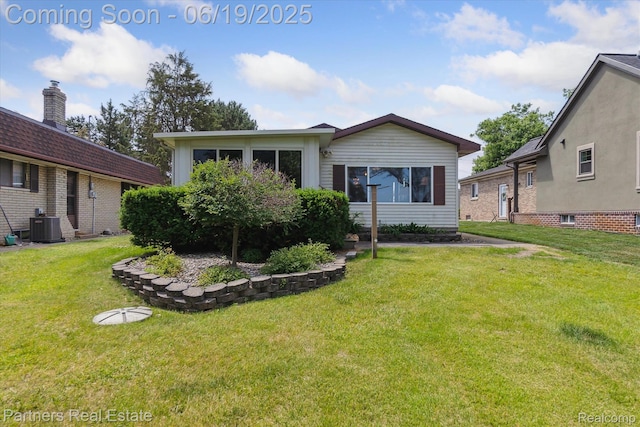 8331 Hilton Rd, Brighton, MI 48114 - view of front of home featuring a front lawn