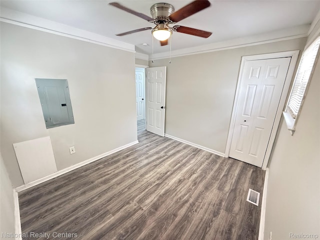 23074 Bolam Ave, Warren, MI 48089 - unfurnished bedroom with electric panel, wood finished floors, ornamental molding, a closet, and ceiling fan