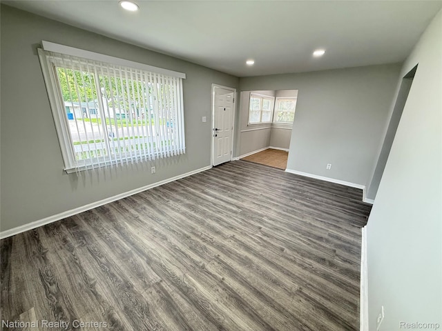 23074 Bolam Ave, Warren, MI 48089 - unfurnished living room featuring recessed lighting and dark wood-style flooring