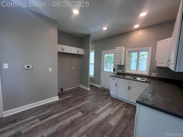 101 Morrell St, Yale, MI 48097 - kitchen featuring dark countertops, white cabinetry, and recessed lighting