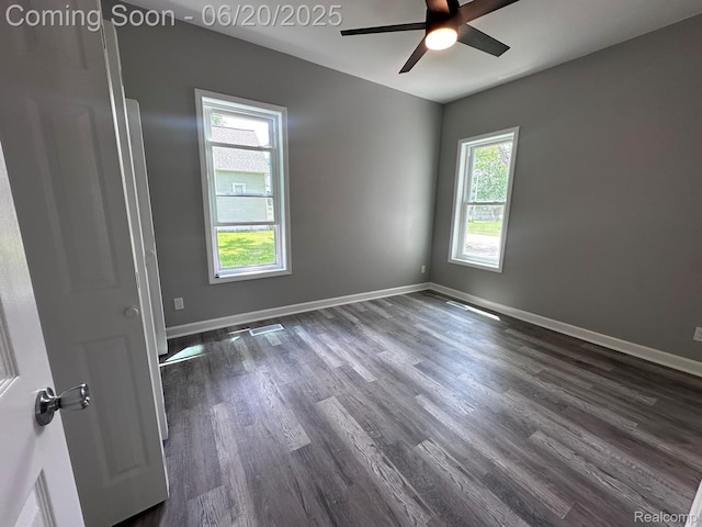 101 Morrell St, Yale, MI 48097 - spare room with dark wood-style floors and a ceiling fan