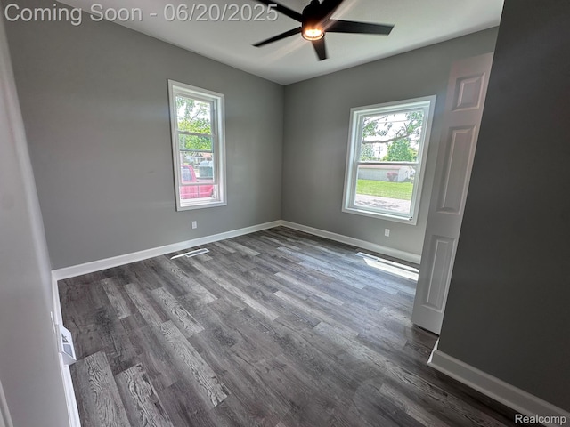 101 Morrell St, Yale, MI 48097 - unfurnished room with dark wood-style flooring and a ceiling fan