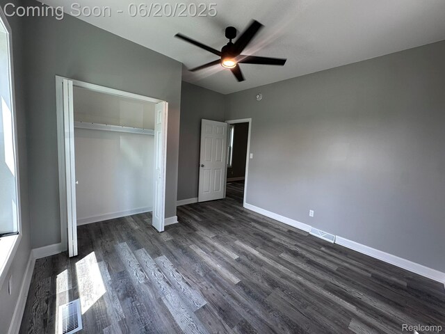 101 Morrell St, Yale, MI 48097 - unfurnished bedroom featuring dark wood-type flooring, a closet, and a ceiling fan