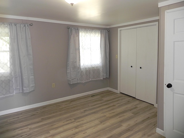 26370 S Shore Dr, Mendon, MI 49072 - unfurnished bedroom with wood finished floors and a closet