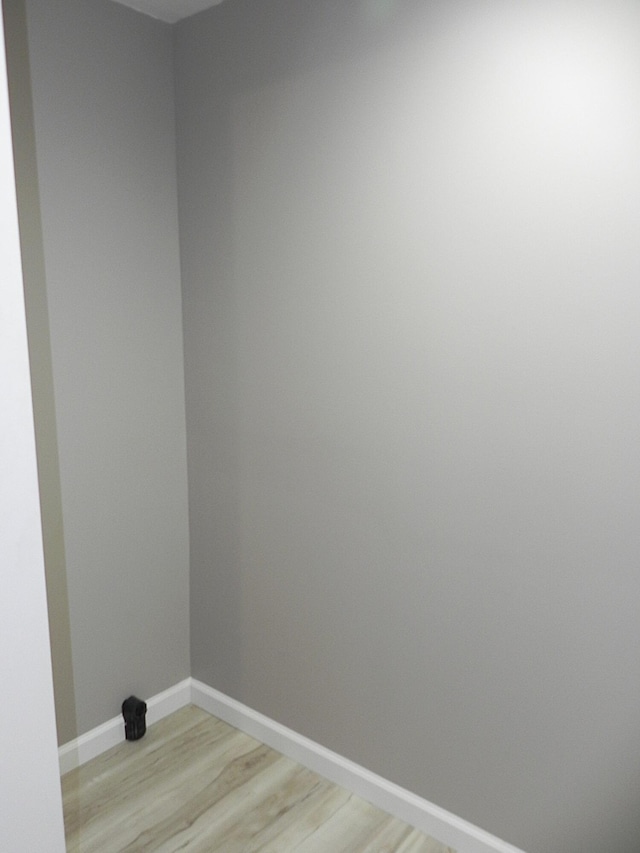 26370 S Shore Dr, Mendon, MI 49072 - washroom featuring light wood-style flooring and baseboards