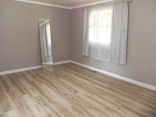 26370 S Shore Dr, Mendon, MI 49072 - spare room featuring wood finished floors and ornamental molding