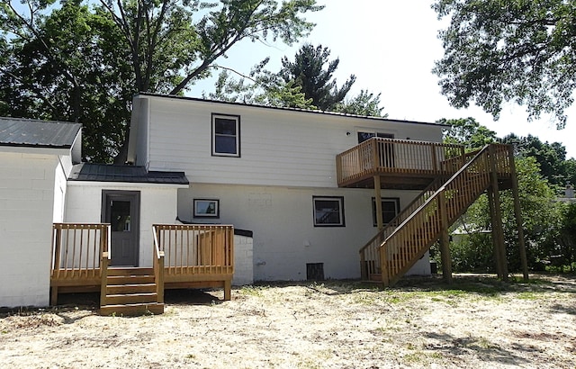 26370 S Shore Dr, Mendon, MI 49072 - rear view of property with a deck, stairs, and a metal roof