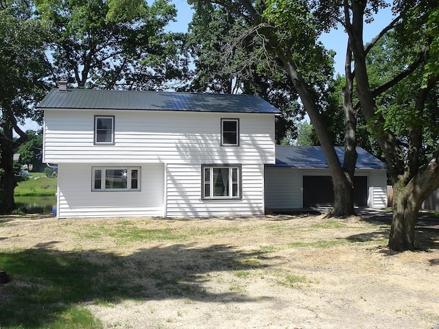26370 S Shore Dr, Mendon, MI 49072 - rear view of house featuring a metal roof