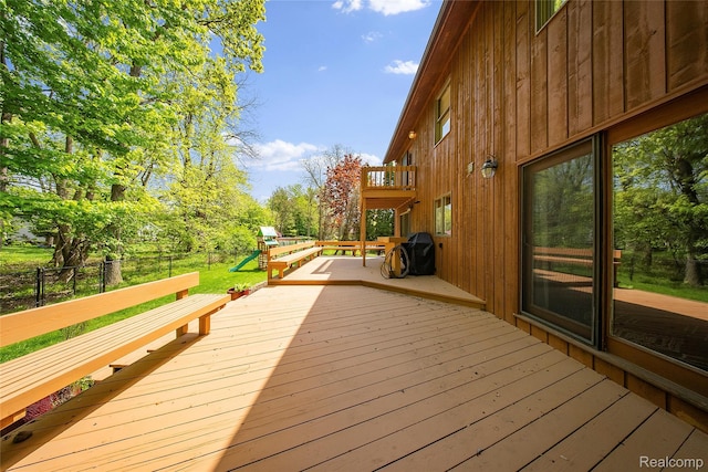 8206 Saint James Ct, Grosse Ile, MI 48138 - wooden terrace with a playground