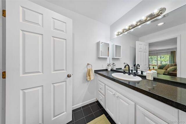 8206 Saint James Ct, Grosse Ile, MI 48138 - bathroom featuring vanity and tile patterned floors