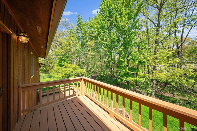 8206 Saint James Ct, Grosse Ile, MI 48138 - wooden deck with a lawn