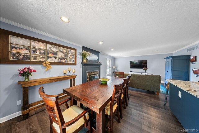8206 Saint James Ct, Grosse Ile, MI 48138 - dining space with a glass covered fireplace, dark wood-type flooring, ornamental molding, a textured ceiling, and recessed lighting