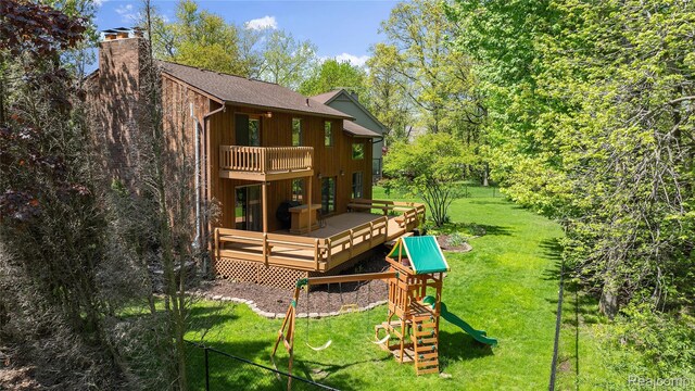 8206 Saint James Ct, Grosse Ile, MI 48138 - rear view of house with a playground, a yard, a chimney, a balcony, and a deck