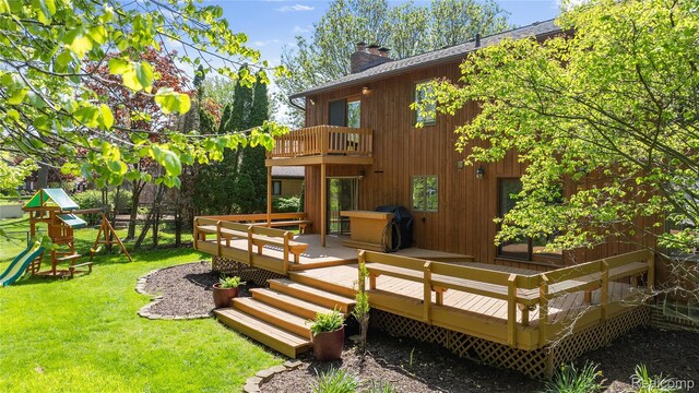8206 Saint James Ct, Grosse Ile, MI 48138 - back of house with a balcony, a chimney, a lawn, a playground, and a deck