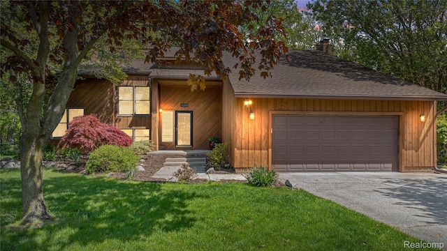 8206 Saint James Ct, Grosse Ile, MI 48138 - mid-century home with a garage, driveway, a front yard, a shingled roof, and a chimney