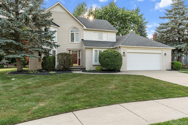 2896 Chippewa Ct, Troy, MI 48085 - traditional-style home featuring brick siding, a garage, driveway, and a front yard