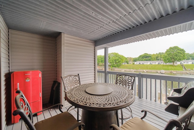 317 5th Ave Unit 8, Manistee, MI 49660 - wooden terrace featuring a water view