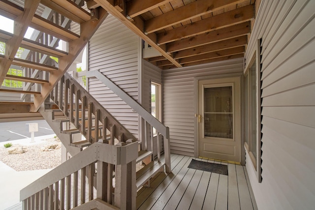 317 5th Ave Unit 8, Manistee, MI 49660 - property entrance with a wooden deck