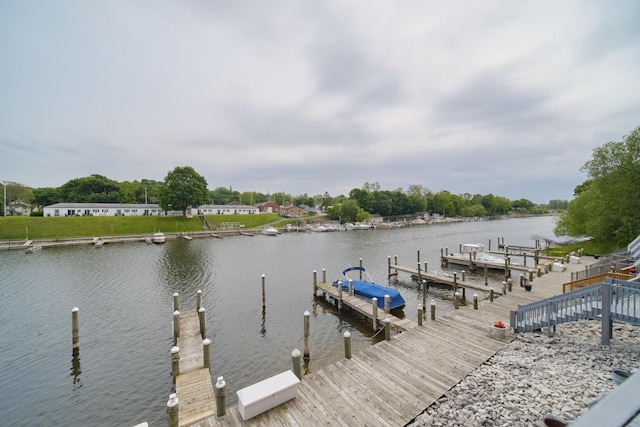 317 5th Ave Unit 8, Manistee, MI 49660 - dock featuring a water view