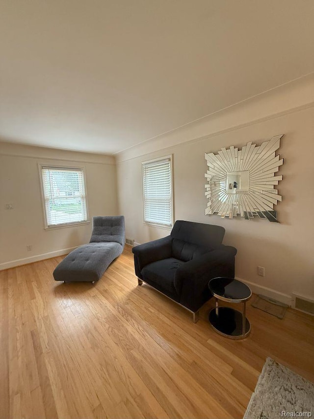 2130 Geneva St, Dearborn, MI 48124 - living area featuring wood finished floors and baseboards