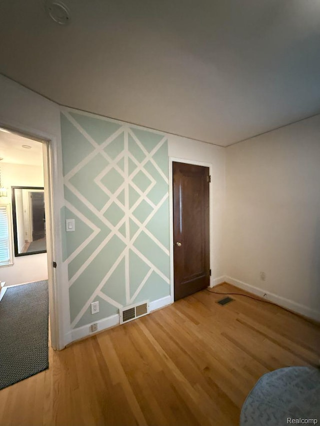 2130 Geneva St, Dearborn, MI 48124 - empty room featuring wood finished floors