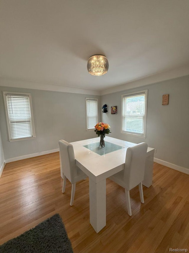 2130 Geneva St, Dearborn, MI 48124 - dining space with light wood-style flooring and baseboards