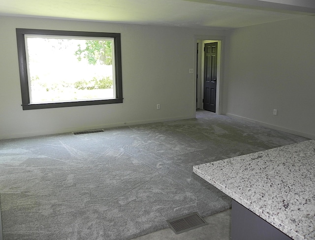 27869 M-60, Mendon, MI 49072 - spare room featuring carpet floors and baseboards