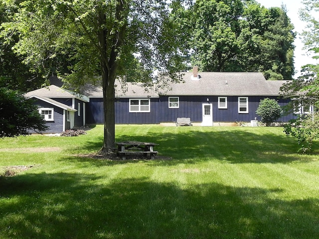 27869 M-60, Mendon, MI 49072 - back of property featuring a lawn and a chimney