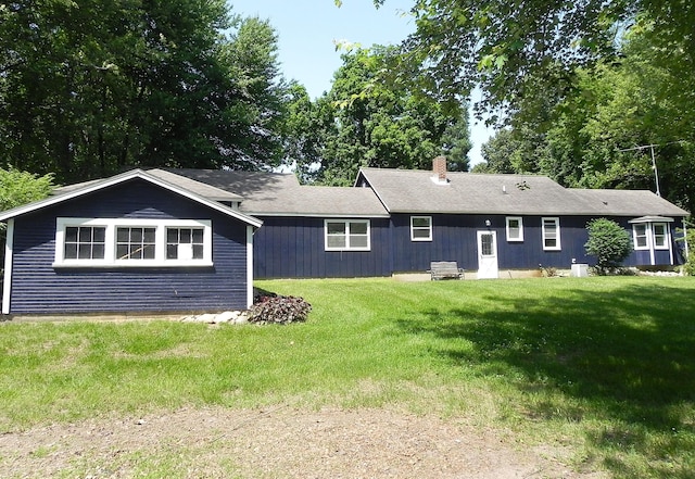 27869 M-60, Mendon, MI 49072 - back of house featuring a chimney and a yard